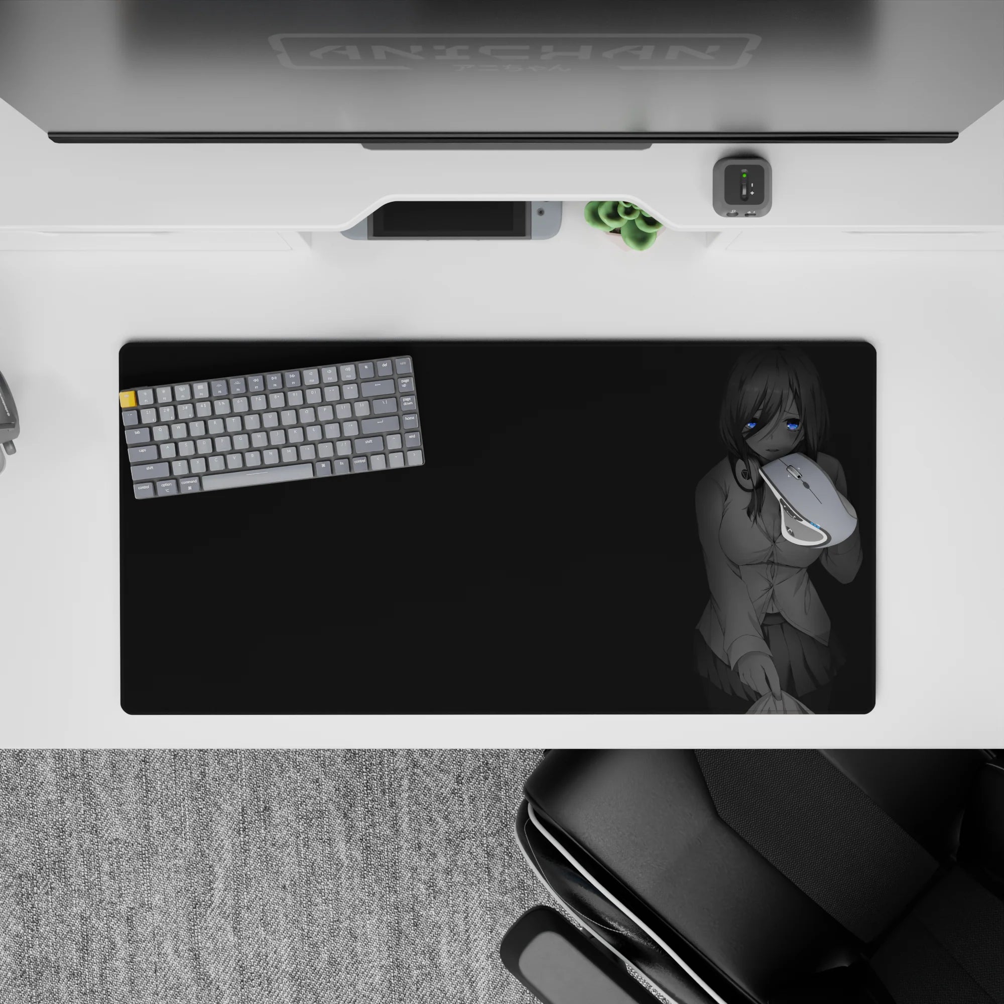 Moody grayscale anime girl mouse pad 32x16 inches with calm, teasing vibe and subtle blue eyes on black.