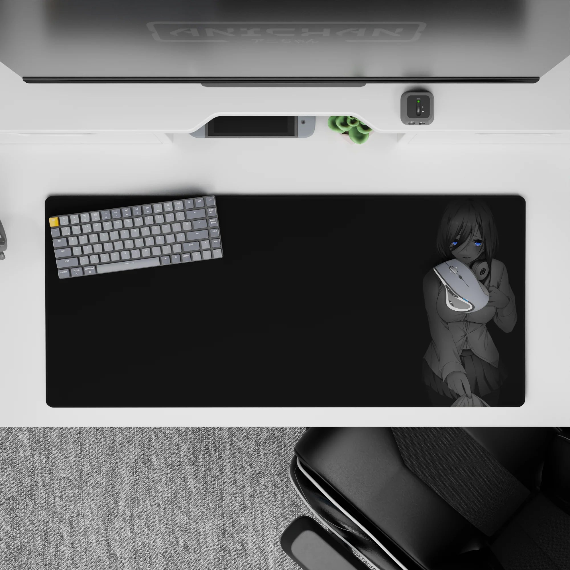 36x16 inches anime desk pad in calm grayscale with moody dark backdrop, cozy late-night gaming and study vibe.