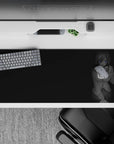 36x16 inches anime desk pad in calm grayscale with moody dark backdrop, cozy late-night gaming and study vibe.