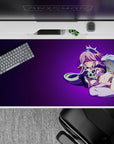 Dreamy neon vibe desk pad 40x20 inches in midnight violet, pink accents, soft tones, and flirty feel.