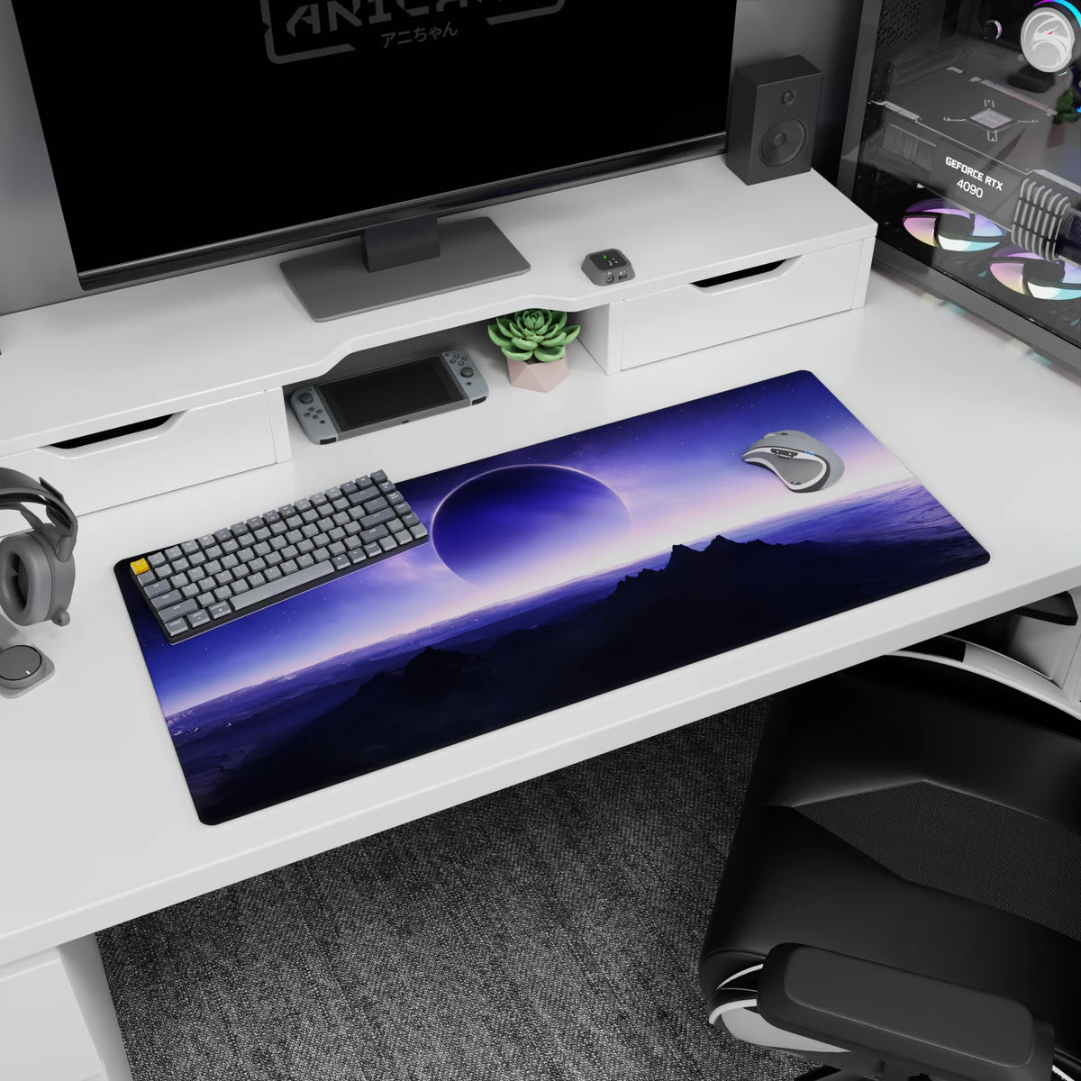 36x16 inches desk pad featuring a huge moon over dark mountain silhouettes beneath a quiet alien sky.