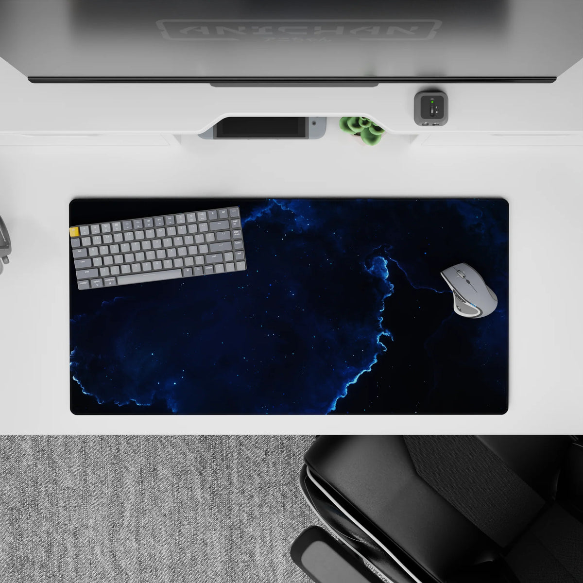 Moody inky black and deep ocean blue mouse pad 32x16 inches with electric blue highlights and star dust.