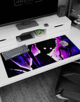 Anime desk pad 36x16 inches showing a silhouetted boy with wild hair and moon-glow eyes in a purple storm.