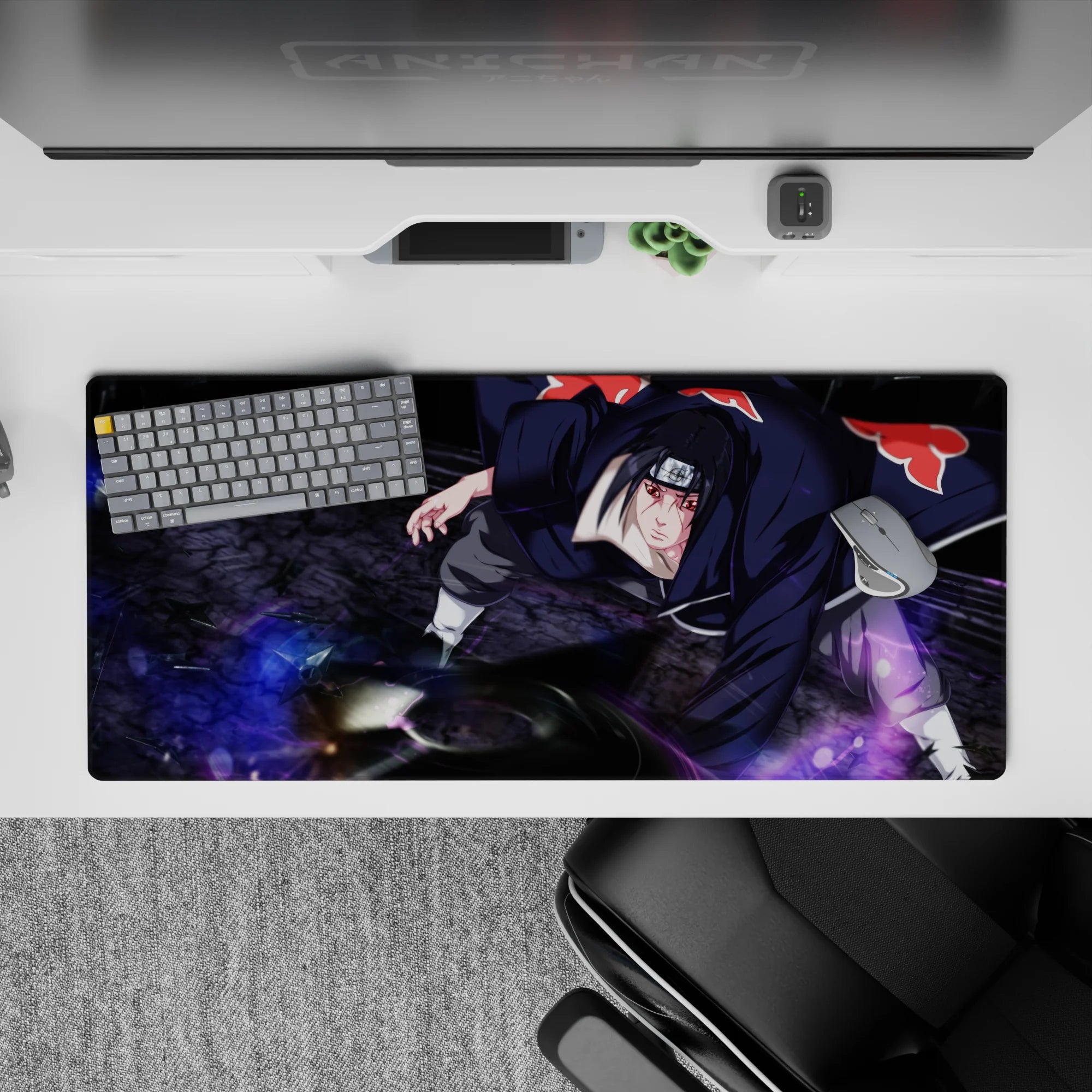 36x16 inches anime desk pad in deep black and crimson with moody purple chakra storm accents.