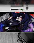 Dark black desk pad with crimson Akatsuki clouds and moody purple storm accents, 40x20 inches.