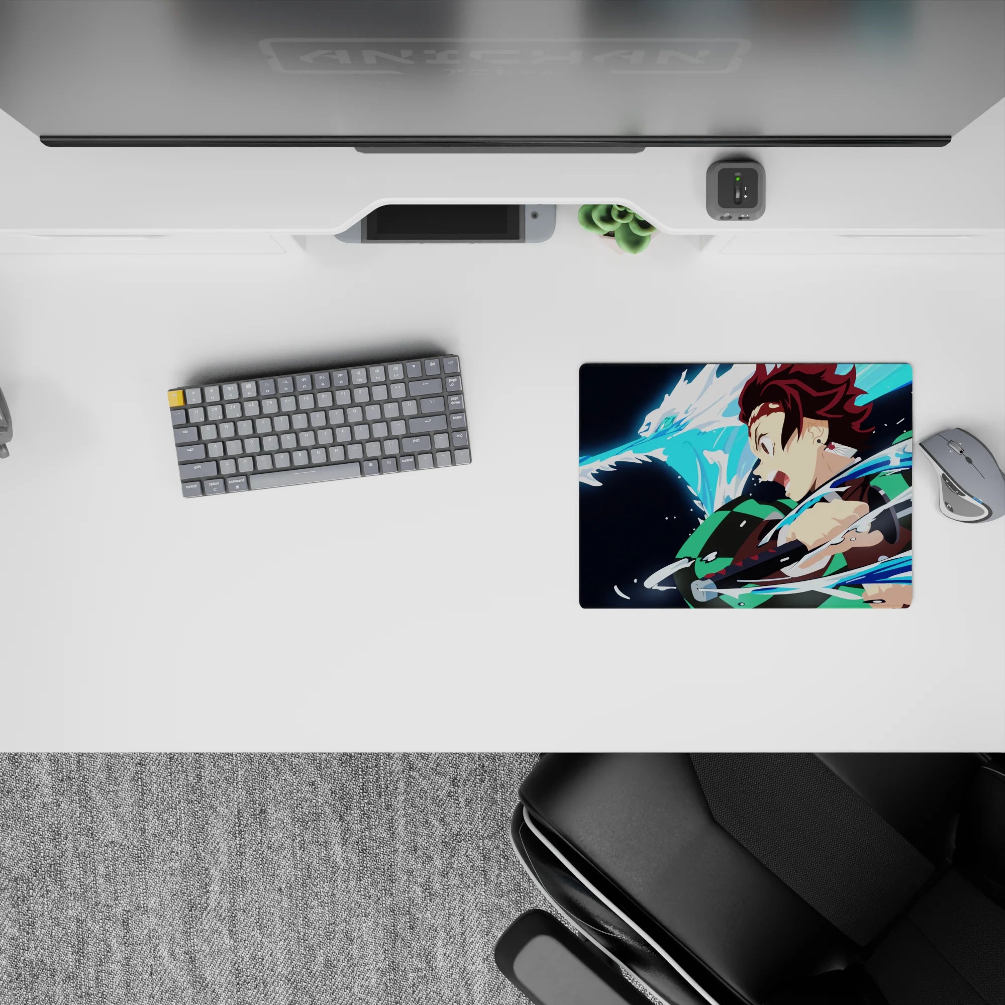 Tanjiro from Demon Slayer unleashing a water dragon on a 14x10 inch mouse pad, featuring vibrant blues and whites.