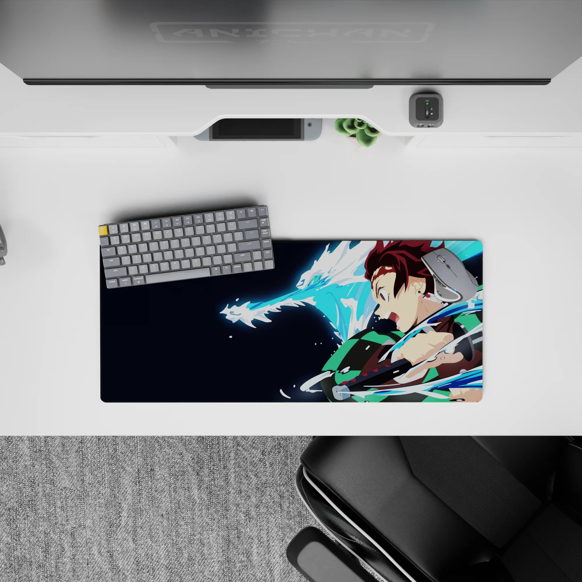 Anime mouse pad 28x12 inches featuring Tanjiro from Demon Slayer, showcasing a dynamic water dragon scene for desk flair.