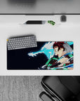 Anime mouse pad 28x12 inches featuring Tanjiro from Demon Slayer, showcasing a dynamic water dragon scene for desk flair.