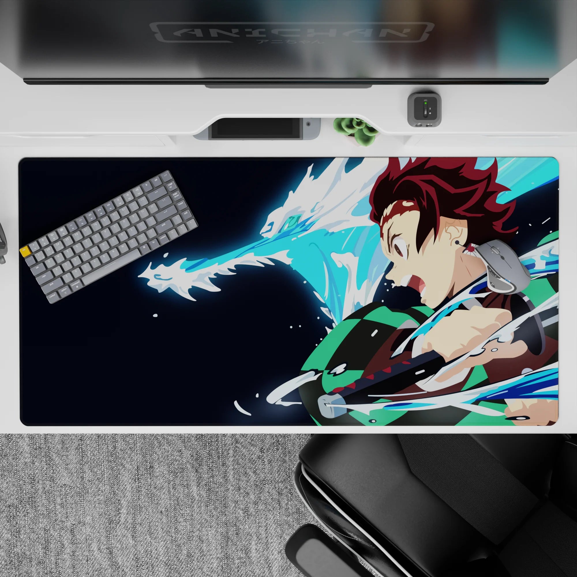 Tanjiro from Demon Slayer on 40x20 inch anime desk pad, water dragon attack, navy backdrop with checkered haori.