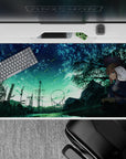 40x20 inches desk pad in teal and midnight blues, cozy lonely nightscape with bright meteor streaks.