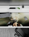 Moody 36x16 inches anime desk pad in smoky greens with soft sun flare, gritty shadows, and hand-painted feel.