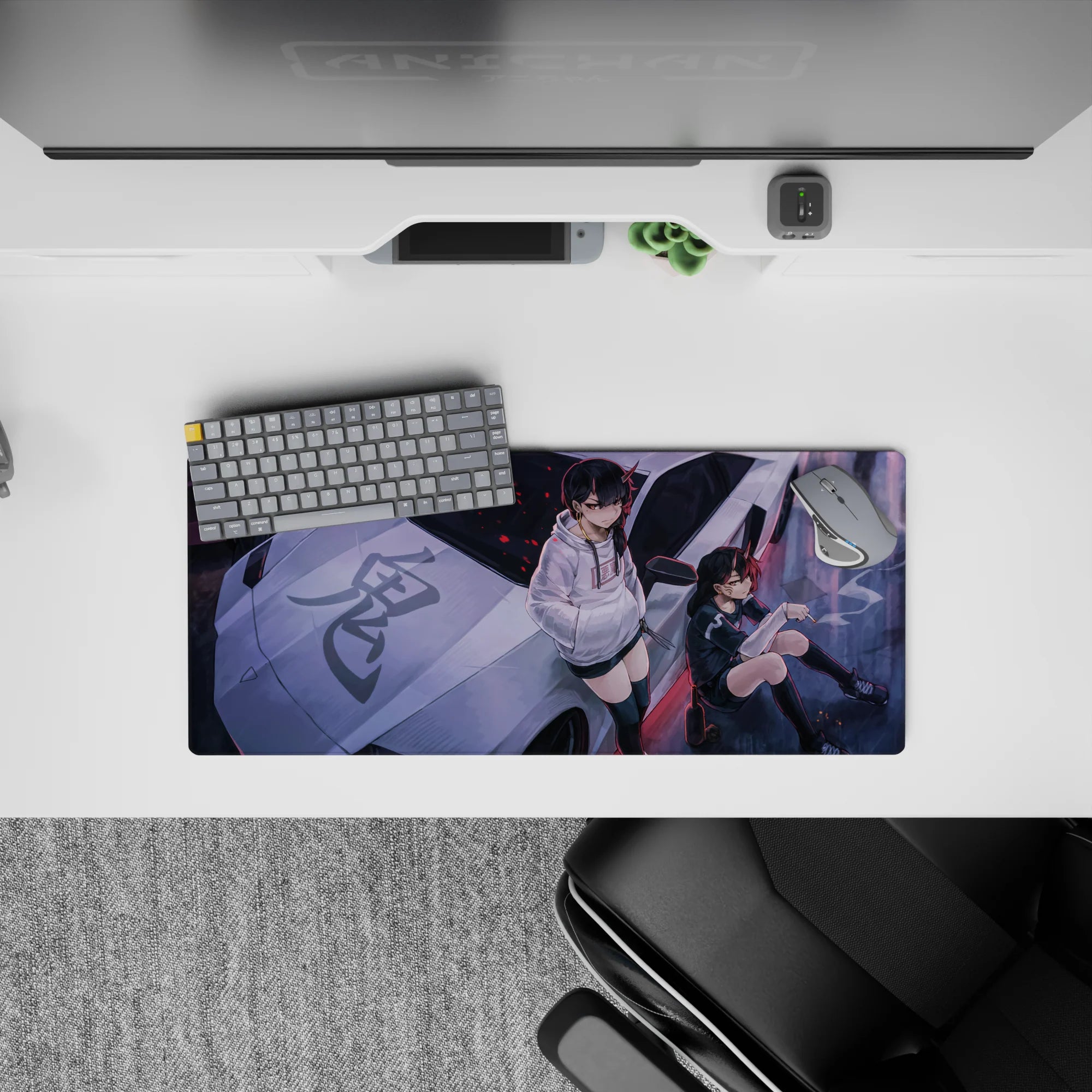 Moody purple street anime girl mouse pad 28x12 inches, black-and-white hoodies with red spark flecks.