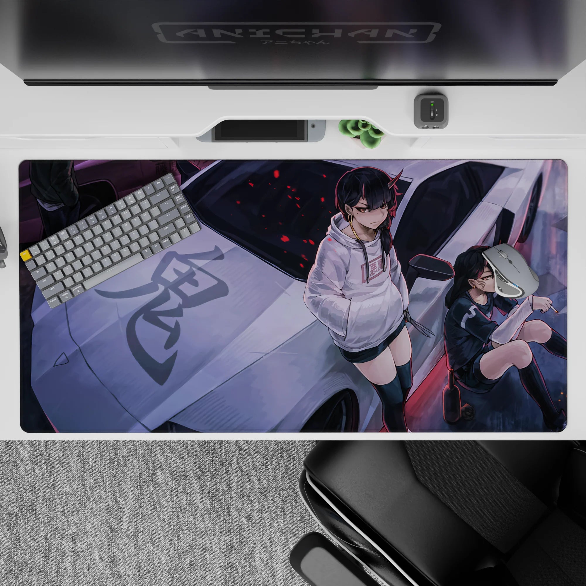 Purple street mood anime desk pad 40x20 inches in black and white hoodies with red spark flecks.