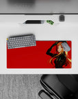 28x12 inches anime desk mat in bold crimson and glossy black with warm orange hair, cool-girl vibe.