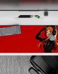 Crimson-and-black anime desk pad 36x16 inches, cool-girl energy with warm orange hair accents.