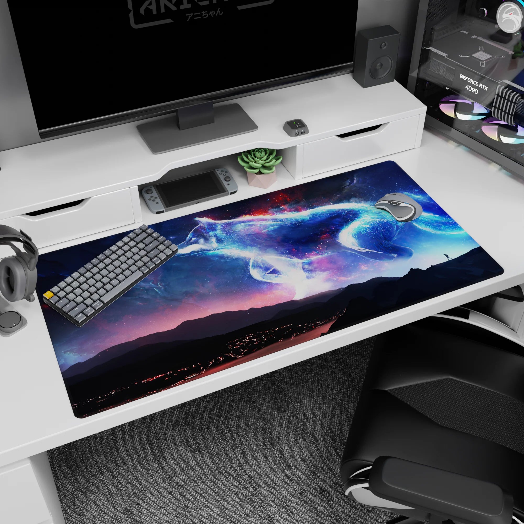 Glowing blue wolf in a starry sky with a tiny traveler on a ridge desk pad, 40x20 inches.