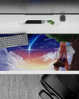 36x16 inches desk pad in peach-violet sunset tones with starry clouds and a blue comet, cozy mood.