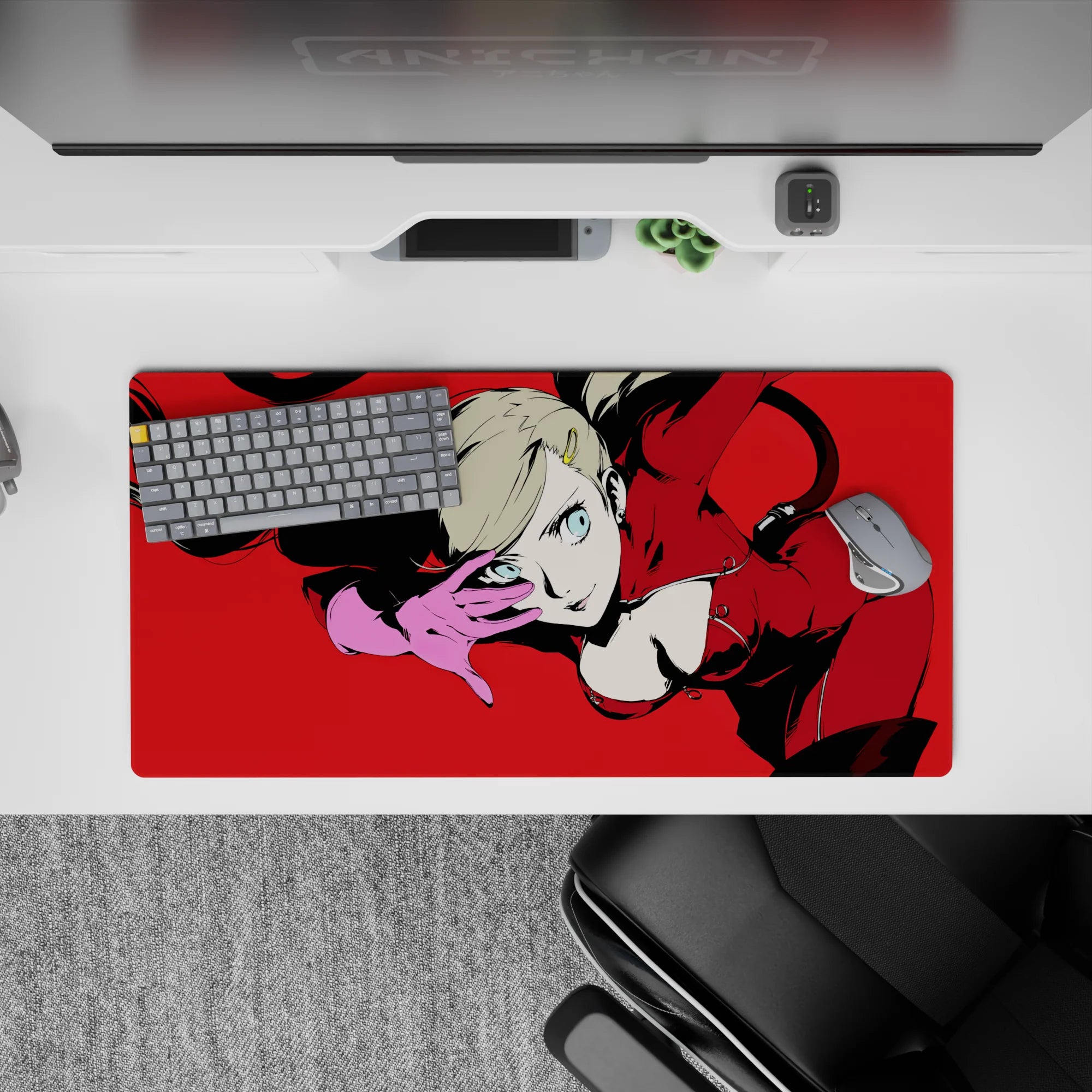Ann Takamaki from Persona 5 in fierce pose on 32x16 inch anime mouse pad, red suit, pink gloves, vibrant red background.