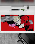 Ann Takamaki from Persona 5 in fierce pose on 32x16 inch anime mouse pad, red suit, pink gloves, vibrant red background.