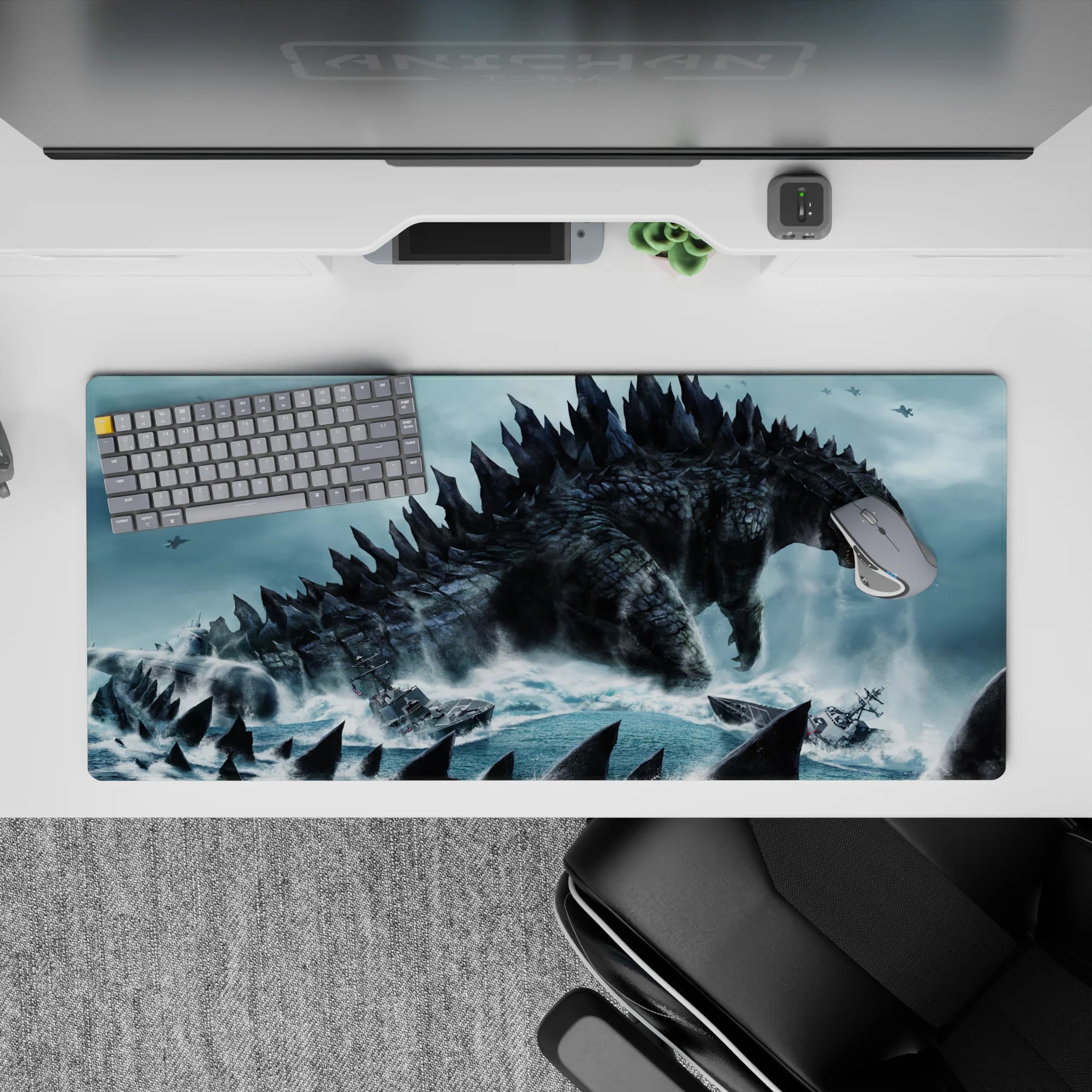 Teal-and-charcoal 36x16 inches anime desk pad, gritty and ominous, with foamy sea spray and dark skies.