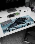 36x16 inches anime desk pad showing a roaring charcoal-scaled sea titan with jagged spines dwarfing fleets.