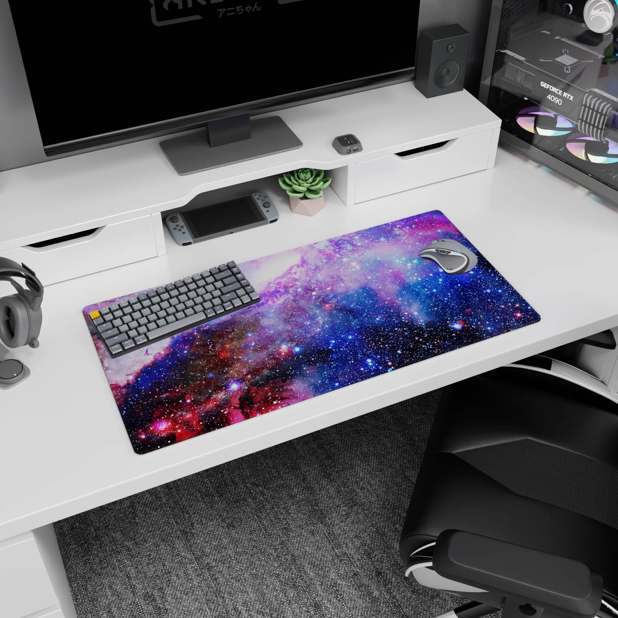 Star-speckled nebula cloud scene mouse pad 32x16 inches with glitter-like dots across a galaxy.