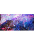 Galaxy swirl desk pad 36x16 inches with star-speckled cosmic pattern for smooth mouse movement.