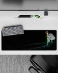 32x12 inches anime mouse pad in inky dark tones with green jacket, white top, and cool blue-eyed mood.