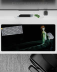 32x16 inches anime mouse pad in inky black with green jacket accents, cool blue eyes, and late-night lab mood.