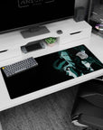 36x16 inches desk pad showing a tight trio of warriors, hair whipping like ink, diagonal stacked faces.