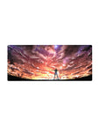 28x12 inches anime mouse pad with heroine on grassy ridge under swirling galaxy clouds and clean horizon.