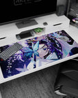 Anime desk pad 40x20 inches featuring Shinobu Kocho from Demon Slayer, surrounded by butterflies and wisteria.