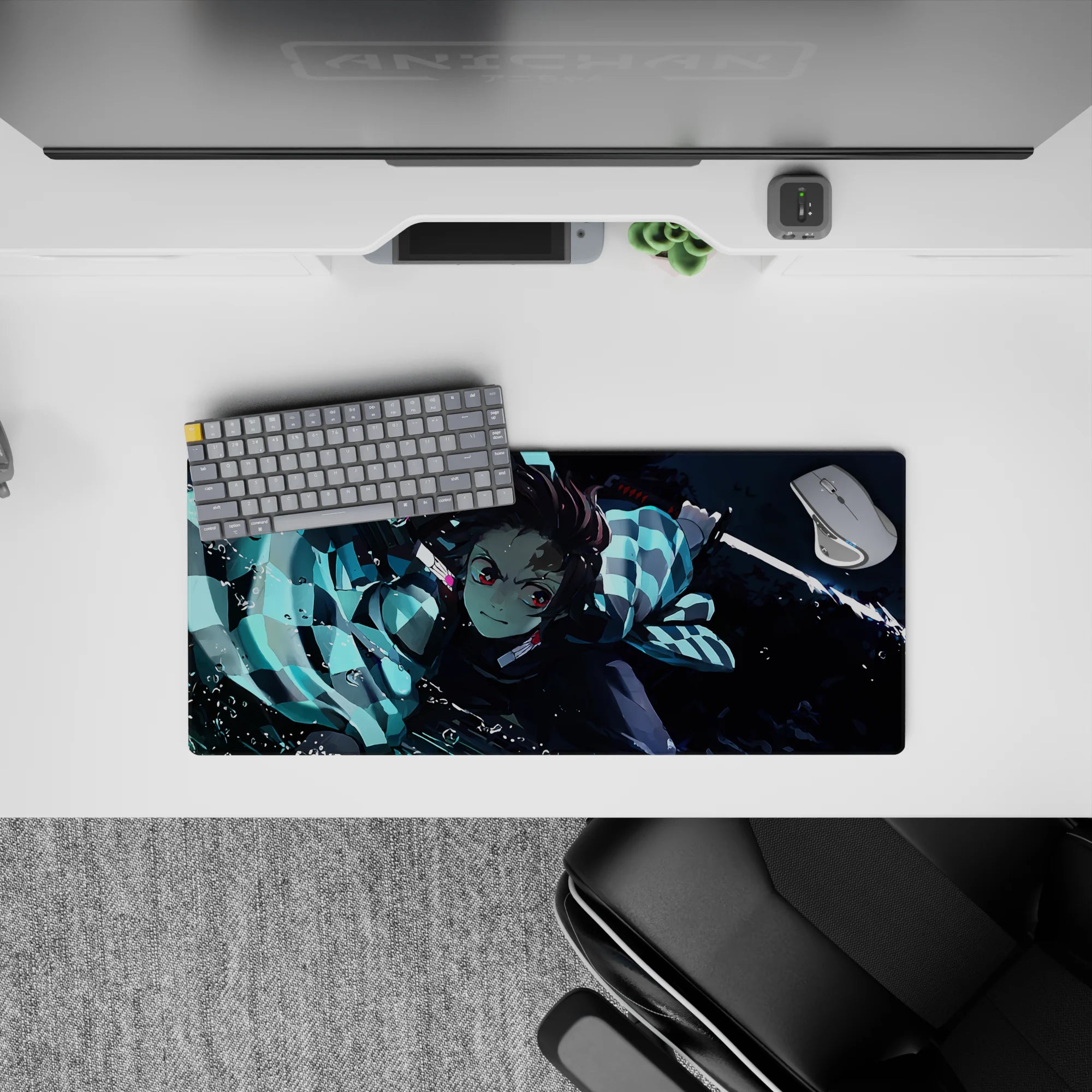 Tanjiro from Demon Slayer mid-strike on a 28x12 inches anime mouse pad, featuring water-breathing style with cool blues.