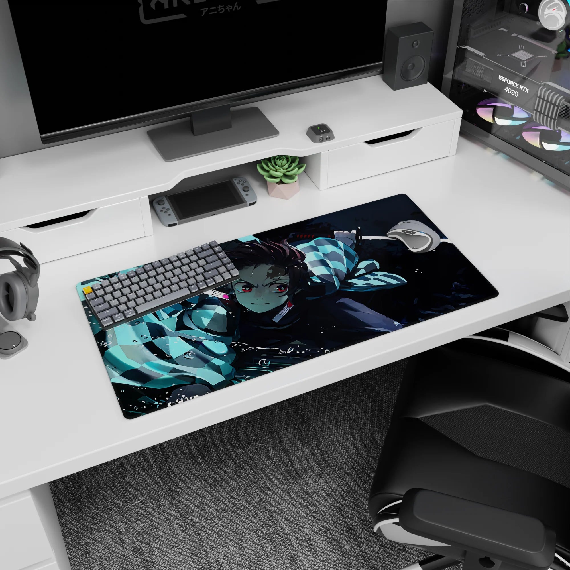 Tanjiro from Demon Slayer on a 32x16 inch anime mouse pad, showcasing his water-breathing style with vivid blues.
