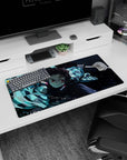 Tanjiro from Demon Slayer on a 32x16 inch anime mouse pad, showcasing his water-breathing style with vivid blues.
