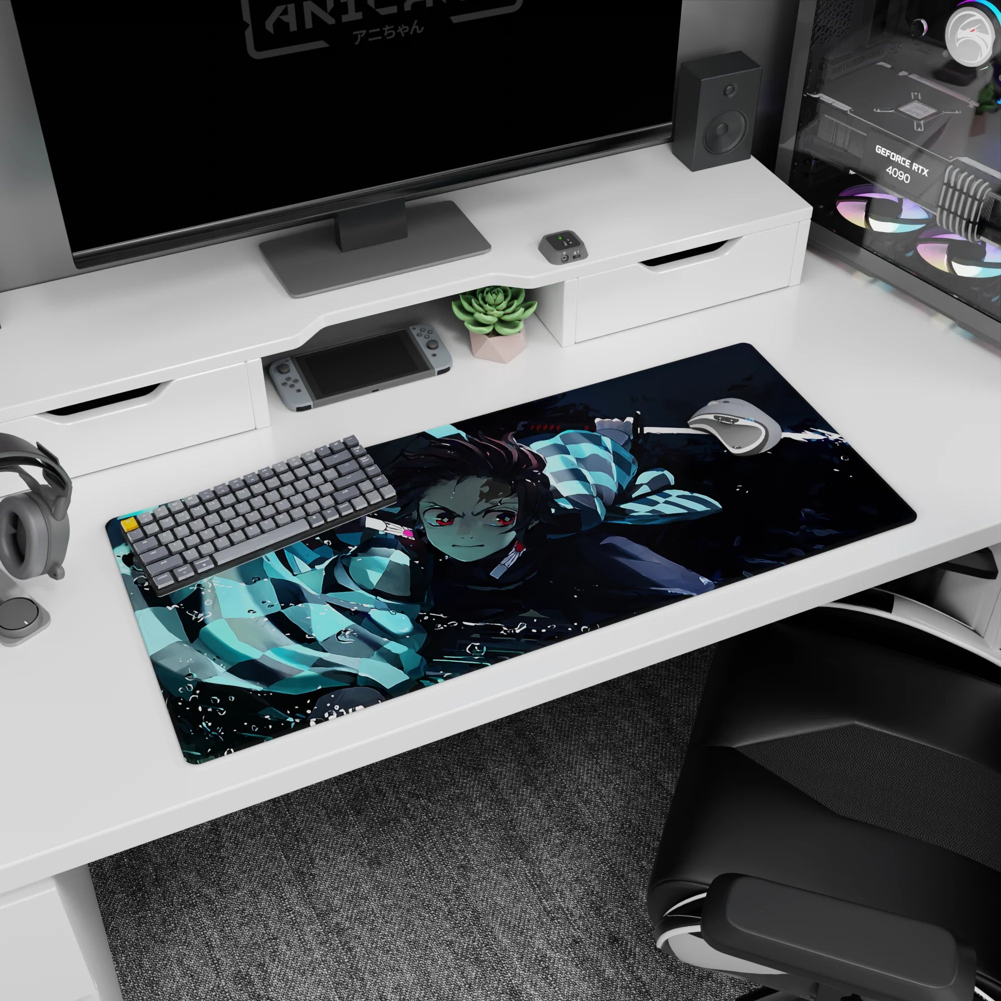 Tanjiro from Demon Slayer in mid-strike on a 36x16 inches anime desk pad, showcasing water-breathing style in vivid blues.