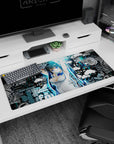36x16 inches anime girl desk pad featuring Hestia from DanMachi, bright blue eyes, ribbon, and twin tails.