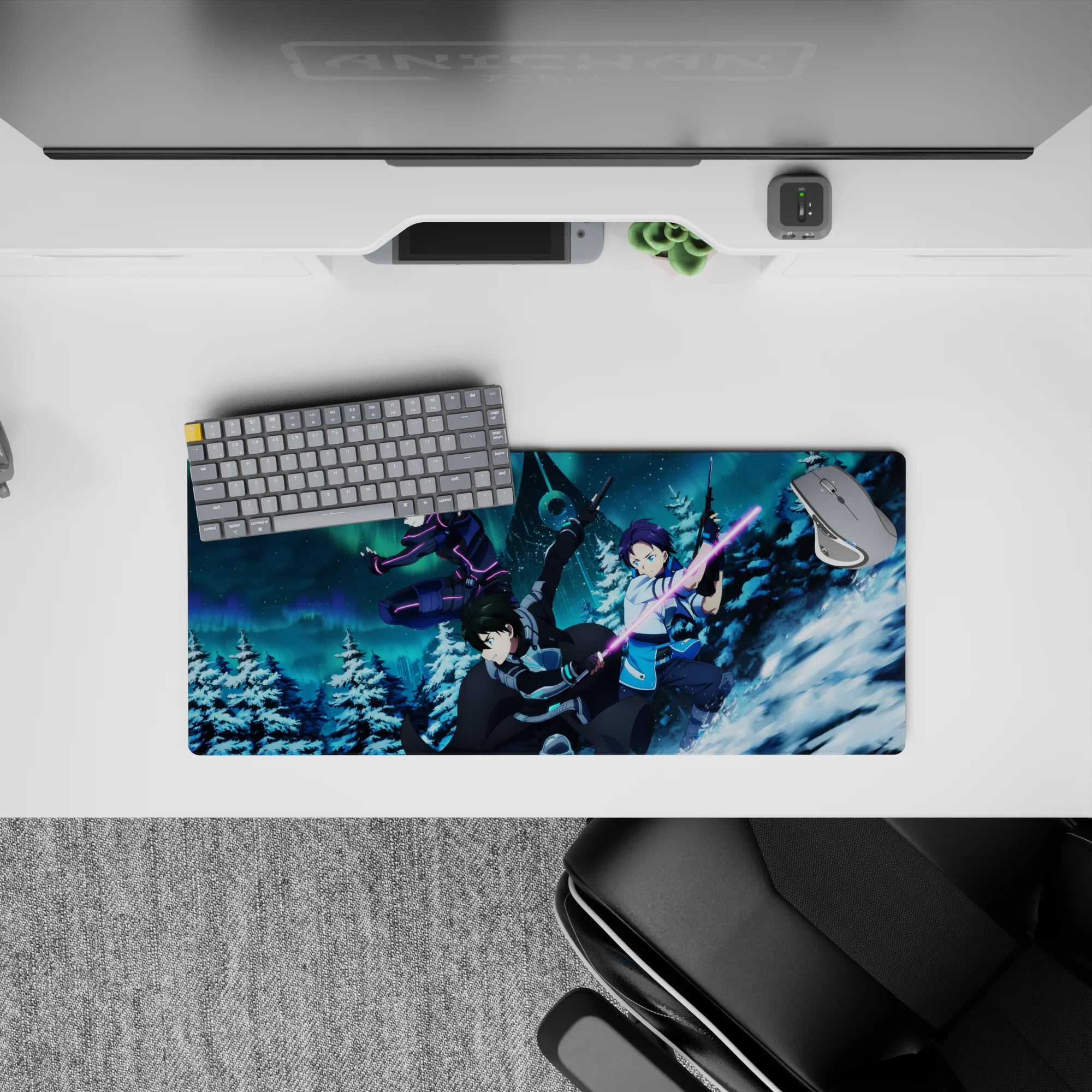 Anime mouse pad featuring Kirito from Sword Art Online, measuring 28x12 inches, showcasing a dynamic snow-lit battle scene.