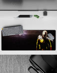 32x12 inches anime mouse pad in bold yellow and red against deep charcoal shadows, intense One Punch Man vibe.