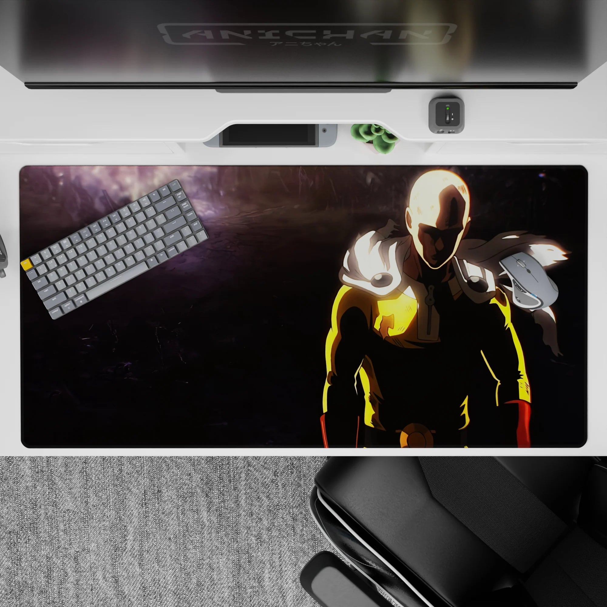 Stormy charcoal anime desk pad 40x20 inches with bold yellow suit and red gloves, intense mood.