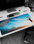 40x20 inches anime desk pad showing a tiny girl silhouette reaching into the wind under wide clouds.