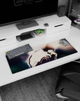 32x12 inches anime mouse pad showing a brooding boy in a loose white shirt, knees up, hand near lips.