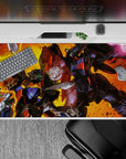 40x20 inches anime desk pad in hot orange-gold blaze, black steel greys, neon green eyes, chaotic energy.