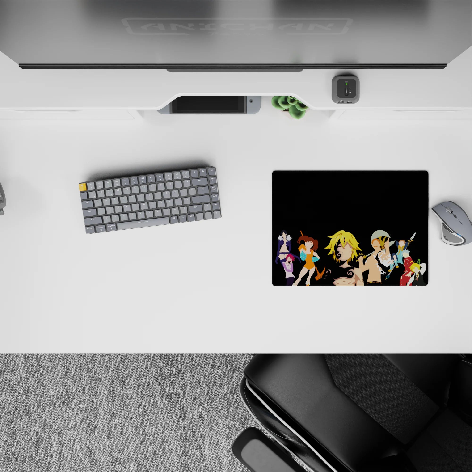 Vibrant anime mouse pad 14x10 inches in orange, teal, red, and violet on sleek black, modern vibe.