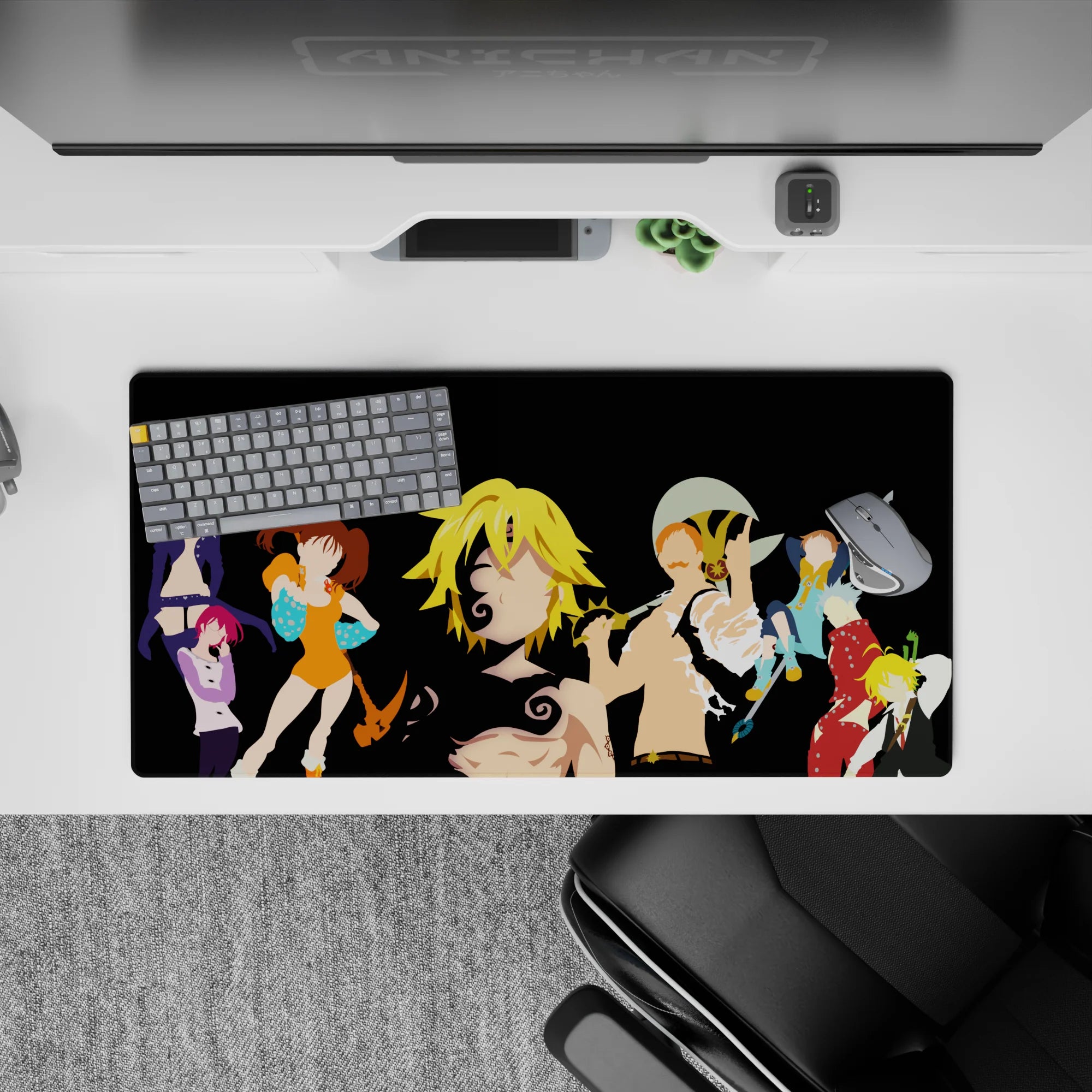 32x16 inches anime mouse pad with orange, teal, red, and violet outfits on a sleek dark background.