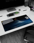Ring-shaped tower rising above starry clouds on a 32x16 inches mouse pad, sleek and mysterious.