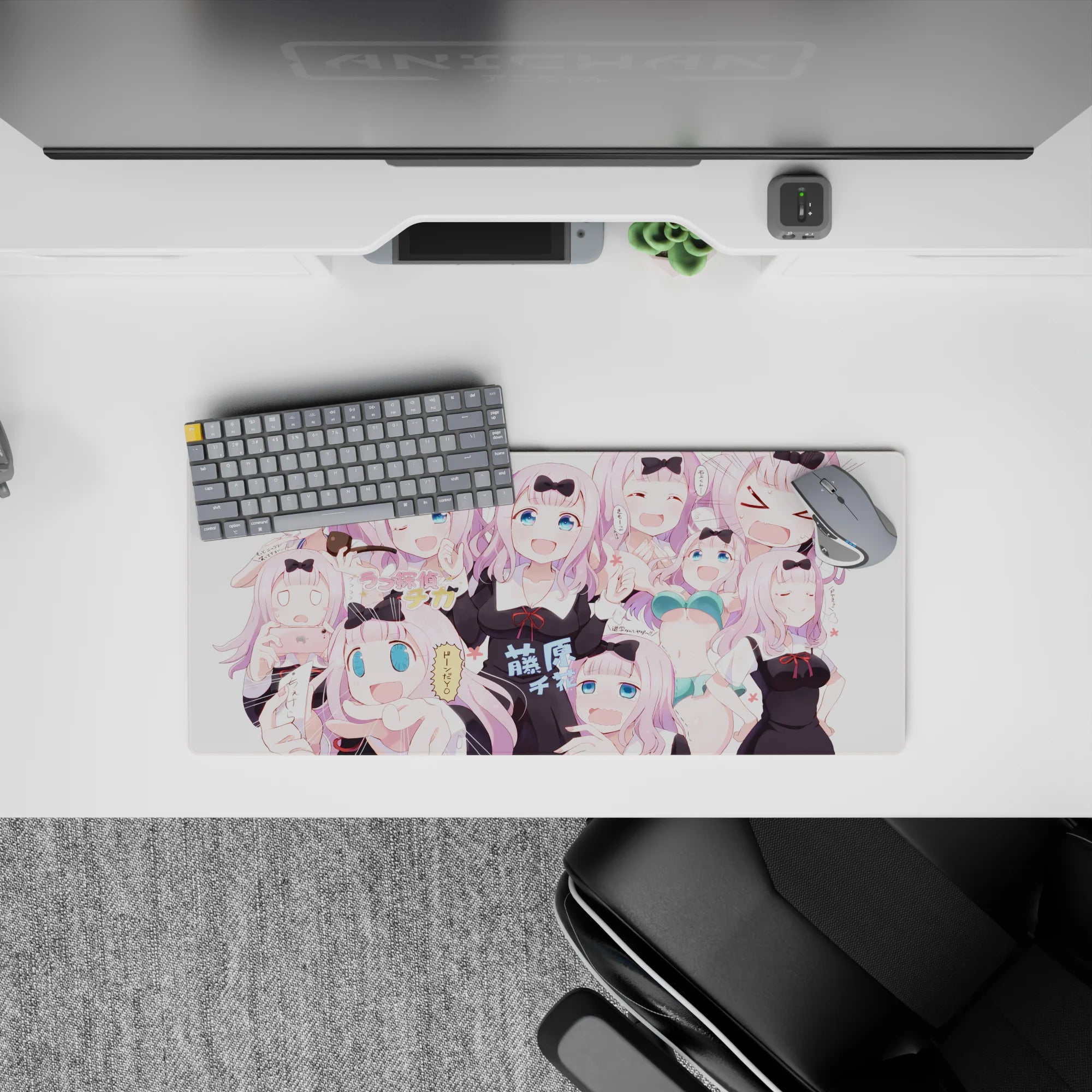 28x12 inches pastel pink anime mouse pad with crisp black ribbons, bright blue eyes, cute chaotic vibe.
