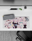 28x12 inches pastel pink anime mouse pad with crisp black ribbons, bright blue eyes, cute chaotic vibe.