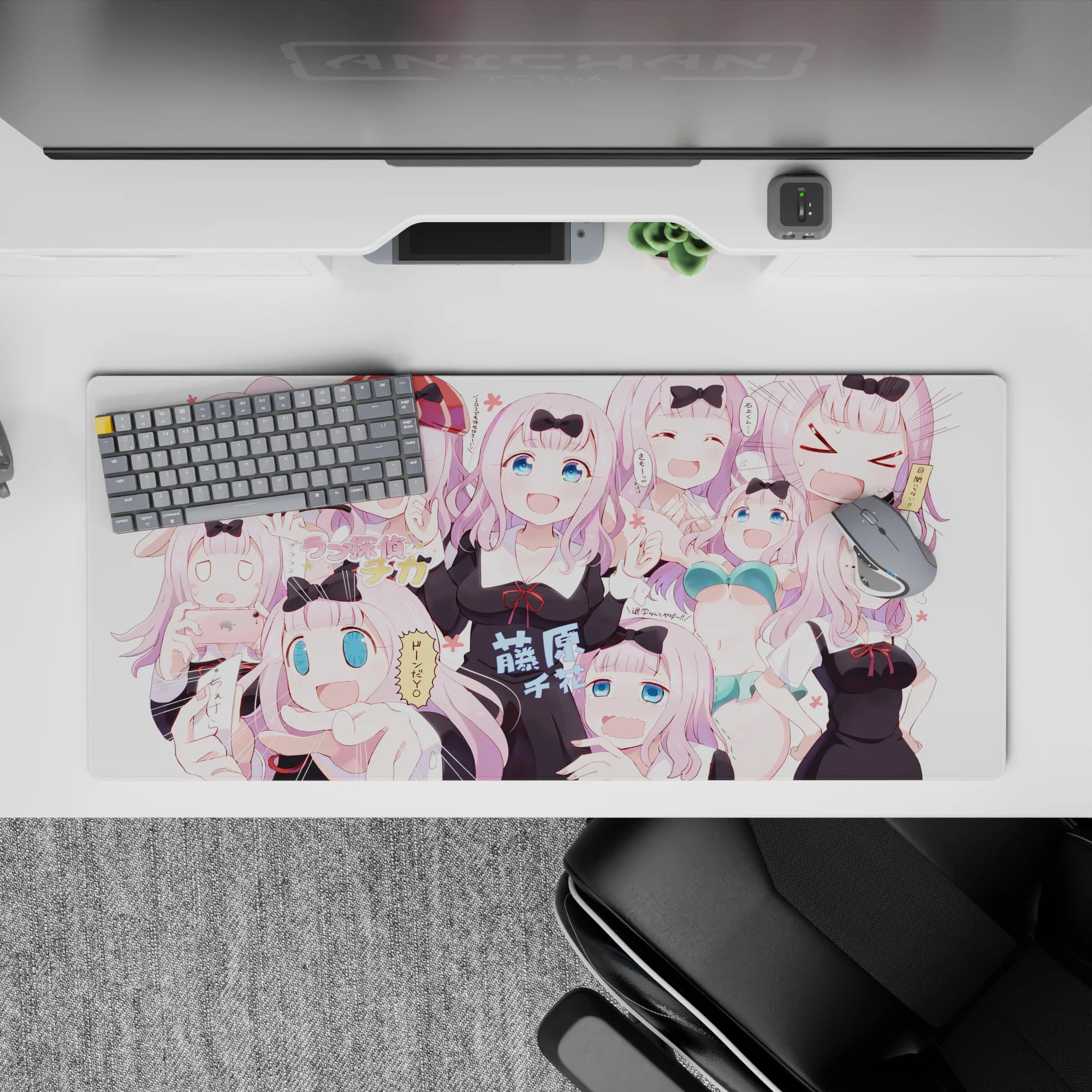 36x16 inches pastel pink anime desk pad, playful Kaguya-sama vibe with bright blue eyes and cute chaos mood.