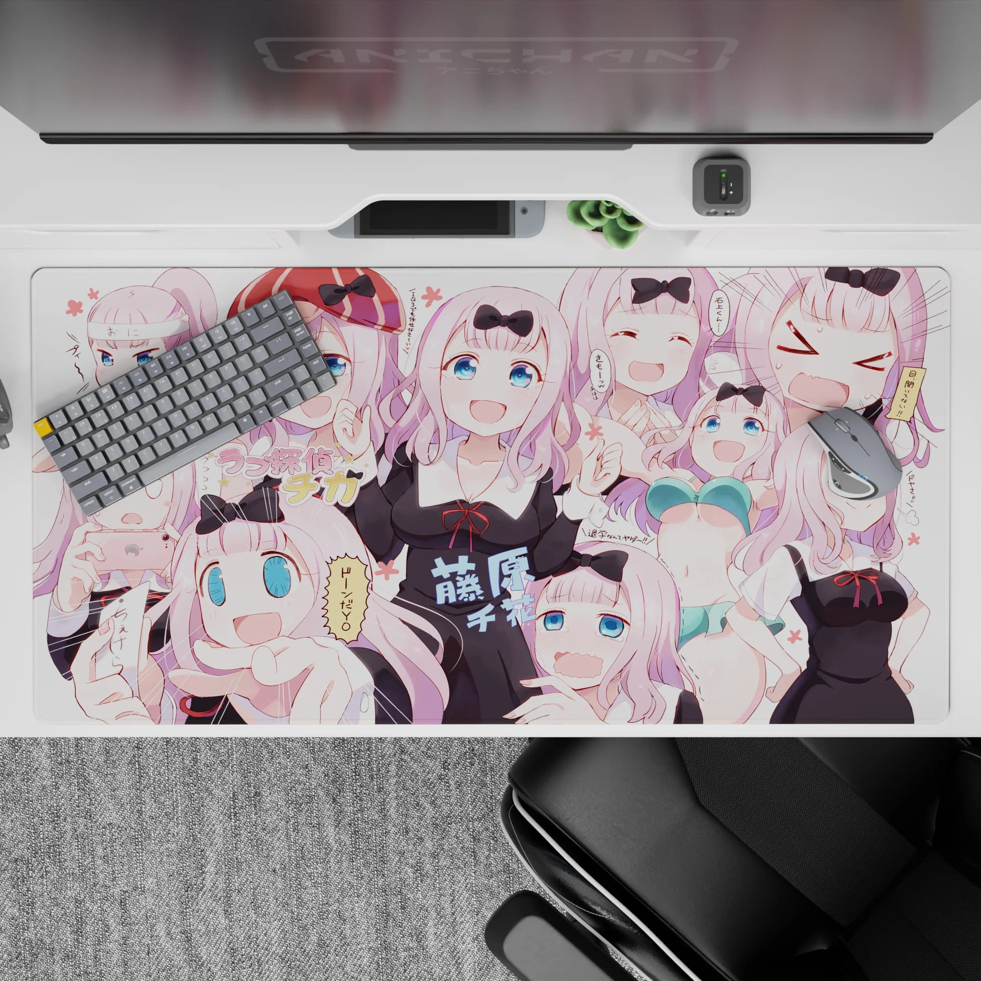 40x20 inches pastel pink desk pad with crisp black ribbons and bright blue eyes, cute chaotic vibe.